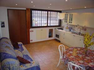 6 person executive apartment with patio view, garden, and private facilities (bath and shower)